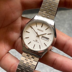Ricoh Riquartz weißes Zifferblatt Vintage Japan Herren Armbanduhr