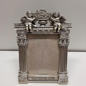 May include: A rustic wooden sign with the text "Welcome to our home" in white lettering. The sign has a distressed finish and a simple, inviting design, ideal for a hallway or porch.