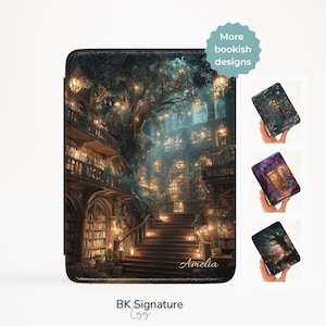 May include: A black e-reader case with a detailed illustration of a library with a staircase, glowing lights, and a large tree. The name "Amelia" is printed on the case. Additional designs are shown on the right. The text "More bookish designs" is also visible.