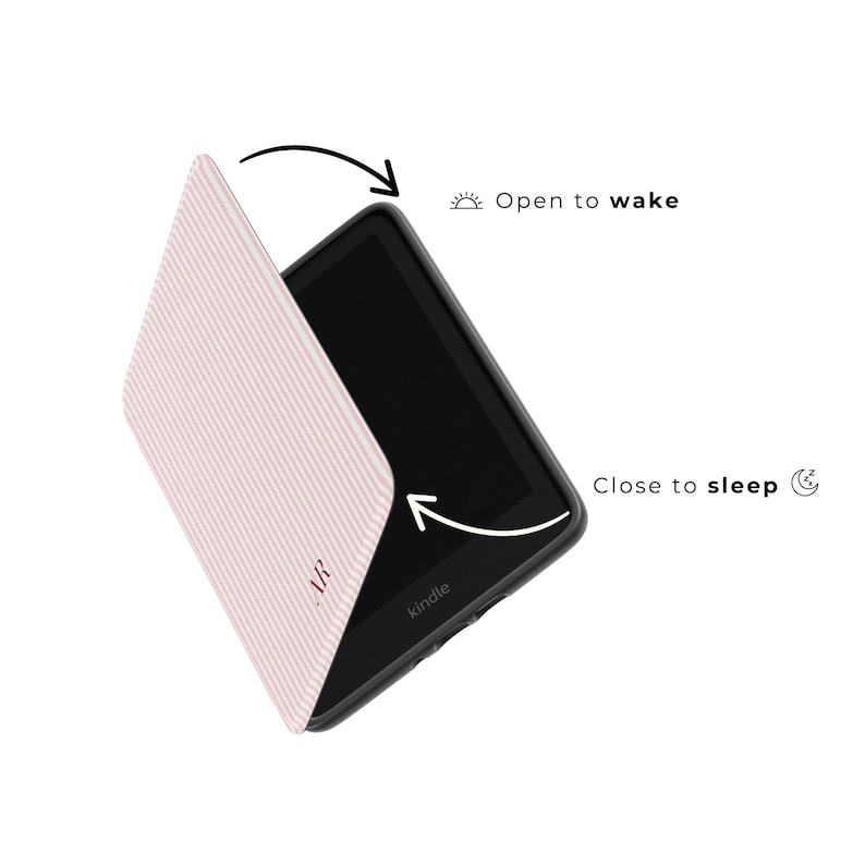 May include: A Kindle e-reader with a light pink cover featuring a white striped pattern. The cover is open, revealing the screen. The text "AR" is visible on the cover. The text "Open to wake" and "Close to sleep" are also visible.