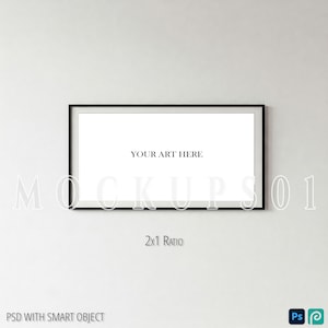 May include: A black frame mockup with the text "YOUR ART HERE" in the center of the frame. The frame is on a white wall. The text "2x1 Ratio" is below the frame. The text "PSD WITH SMART OBJECT" is at the bottom of the image.