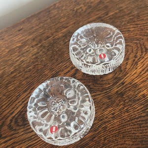 May include: A set of three ceramic mugs with a speckled, matte finish. The mugs are in shades of cream, light gray, and dark gray. Each mug has a simple, minimalist design, perfect for coffee or tea.