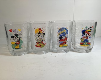 Disney/McDonald’s 2000 Celebration of Disney World glasses.  Sold as a set of 4.