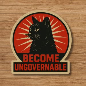 May include: A die-cut sticker featuring a black cat silhouette centred against a red circular background with radiating white sunburst lines. Below the cat, the text BECOME UNGOVERNABLE is printed in bold red capital letters on a black background.