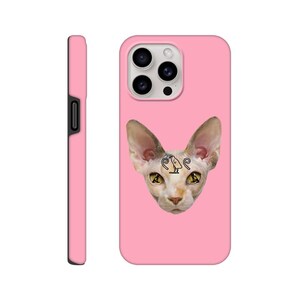 May include: Pink phone case featuring a Sphynx cat with a tattoo on its forehead. The cat has yellow eyes and a pink nose.