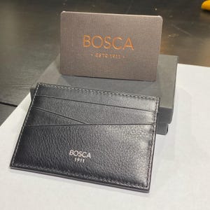 Carteira masculina Bosca de couro preto fina e minimalista com prendedor de dinheiro, rara e fora de estoque