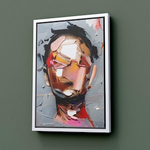 May include: Abstract painting of a person's face with colorful, geometric shapes and a gray background.