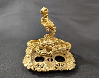 Vintage The Bucklers Gold Cherub Lipstick Holder – Ornate Rococo Style Metal Vanity Organizer – 4 Slot Gilded Lipstick Caddy