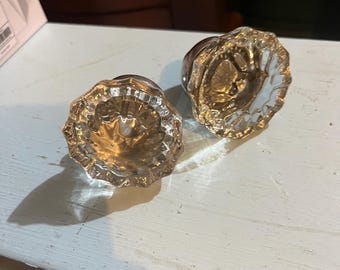 2 glass door knobs
