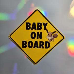 Zestaw 2 elementów Pokemon Baby On Board Naklejka winylowa na samochód i magnes z odblaskowymi hologramowymi gwiazdami, idealny na prezent, 4 cale na 4 cale