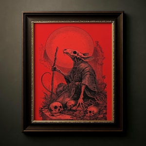 Puede incluir: Impresión artística enmarcada que presenta una figura esquelética con un cráneo de roedor, sosteniendo un bastón, sobre un fondo rojo. La obra de arte incluye calaveras y una gran forma similar al sol. El marco es marrón oscuro.