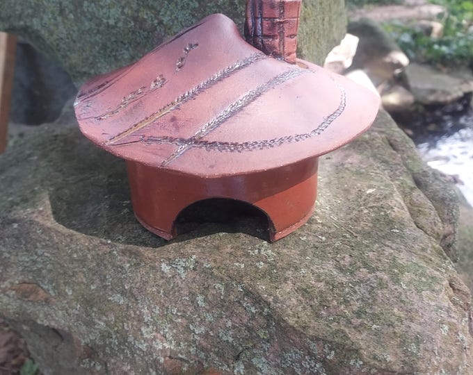 Rustic nature inspired toad abode