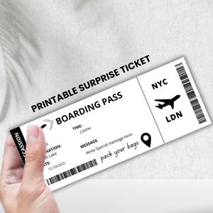 May include: A printable boarding pass ticket with the text "Printable Surprise Ticket" and "Boarding Pass". The ticket has a departure city of NYC and an arrival city of LDN. The ticket also has a time of 2:00PM and a date of 12/03/2025. The text "Write Special message here" and "pack your bags" is also included.