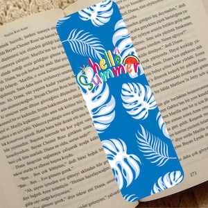 May include: Blue bookmark with white tropical leaves and the words "hello summer" in a colorful design. A watermelon slice and a small umbrella are also featured.