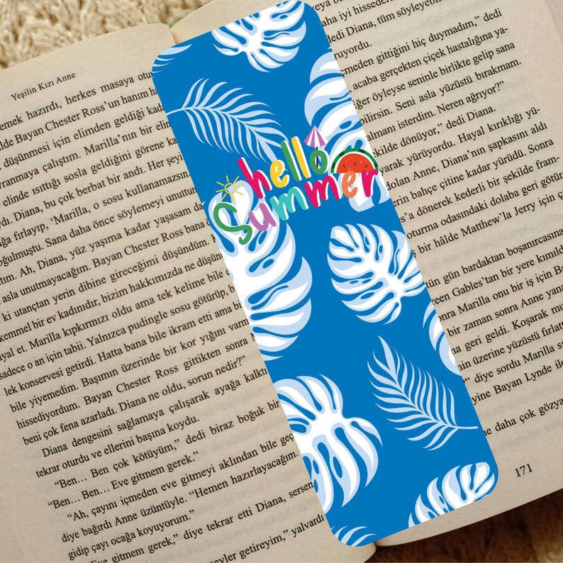 May include: Blue bookmark with white tropical leaves and the words "hello summer" in a colorful design. A watermelon slice and a small umbrella are also featured.