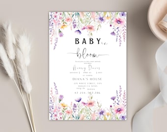 May include: A baby shower invitation with a floral border. The invitation reads "BABY in bloom" in black script. The invitation includes the name Avery Davis, date, time, and location details. The floral border features pink, purple, and yellow flowers.