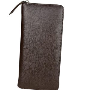 May include: A dark brown, rectangular wallet with a textured surface. The wallet has a zip closure along the top edge and a small leather pull tab. Stitching is visible along the edges.