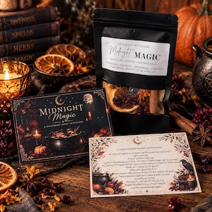 May include: A black pouch of stovetop potpourri labeled Midnight Magic with ingredients including cranberry, orange, cinnamon, juniper, star anise, marigold, and vanilla. Includes two printed cards with Halloween-themed text and imagery.