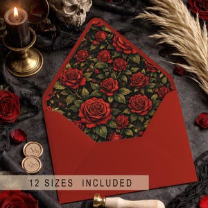 May include: A red envelope with a floral rose pattern interior. The interior design features red roses and green leaves on a dark background. The text "12 SIZES INCLUDED" is printed at the bottom of the envelope.