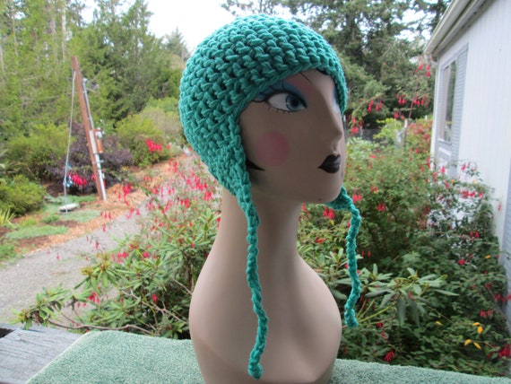 green earflap hat
