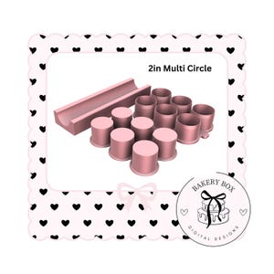 May include: A set of 2-inch round cake decorating tools in pink plastic. The set includes a variety of sizes and shapes, including circles, squares, and rectangles. The tools are arranged in a row on a white background. The text "2in Multi Circle" is visible in the image.