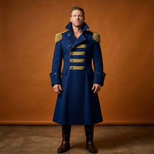 May include: A long, navy blue coat with gold epaulets and trim. The coat features a double-breasted design with gold buttons and a high collar. The coat is paired with brown boots, creating a formal, military-inspired look.