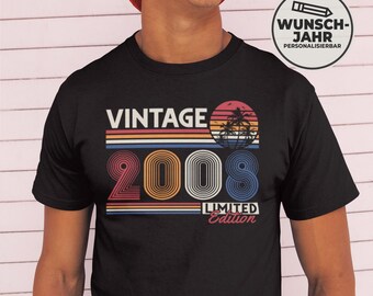 May include: Black t-shirt with a retro design featuring the word "VINTAGE" above the year "2008" in a colorful, outlined font. A sunset graphic with palm trees is above the year, and "LIMITED Edition" is below.