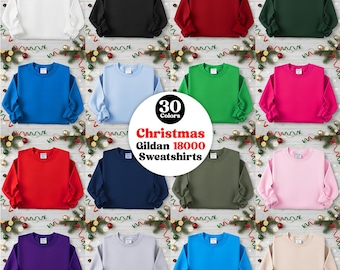 May include: A selection of Gildan 18000 sweatshirts in a variety of colours, such as white, black, red, and blue. The image includes a circular graphic with the text "30 Colors Christmas Gildan 18000 Sweatshirts."