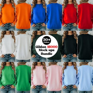以下が含まれることがあります： オレンジ、青、赤、白、緑、ピンク、黒など、さまざまな色のGildan 18000モックアップのコレクション。画像には複数のスウェットシャツがあり、利用可能な色の範囲を示しています。「30+ Colors」と「Gildan 18000 Mock ups BUNDLE」というテキストが表示されています。