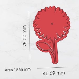 May include: A red sunflower-shaped cookie cutter with a stem and leaf. The cutter is 75 mm tall and 46.69 mm wide. The area is 1,565 mm. The design is a simple outline of a sunflower.