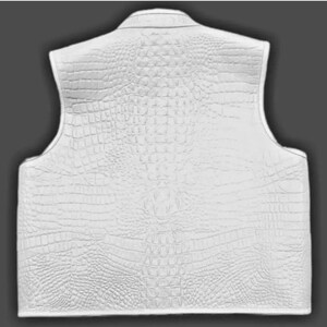 "Backside of stylish white crocodile leather vest, highlighting detailed reptile texture, symmetrical pattern, and luxury craftsmanship. High-end exotic leather apparel designed for fashion-forward men seeking bold, premium, and unique outerwear pieces."