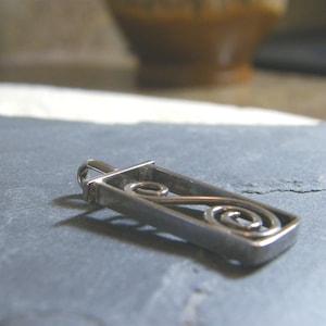 Double Spiral Becoming Pendant. Sterling Silver.