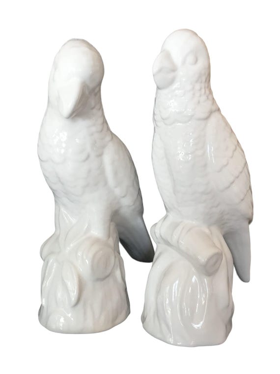 pair white ceramic parrots