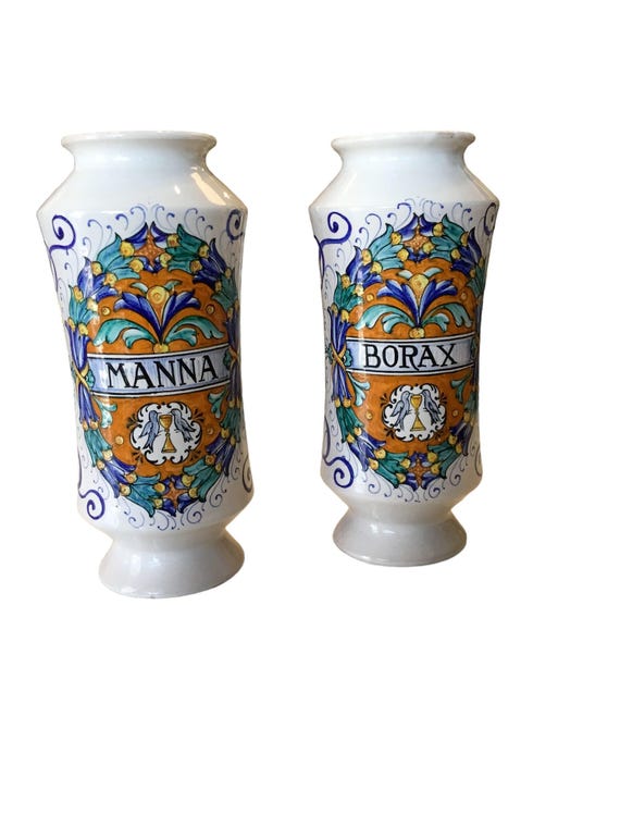 pair hand decorated vases