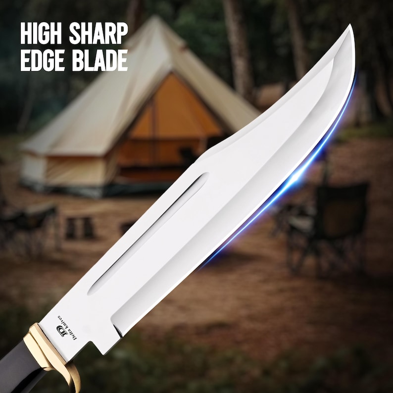 May include: A large, shiny, silver blade knife with a black handle and gold accents. The text "HIGH SHARP EDGE BLADE" is displayed at the top. The knife is set against a blurred outdoor background with a tent.
