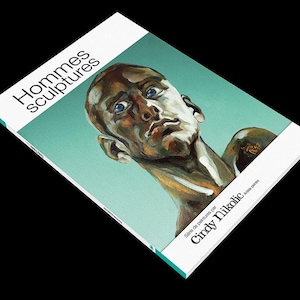 Esculturas de hombres libro