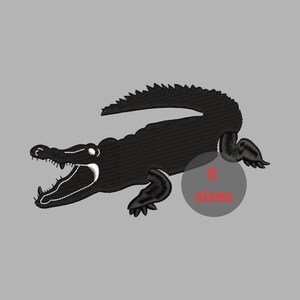 May include: A black embroidered alligator patch with a wide-open mouth showing white teeth. The design features a circular overlay with the red text 5 sizes. The embroidery has a textured stitch pattern throughout the body of the reptile.