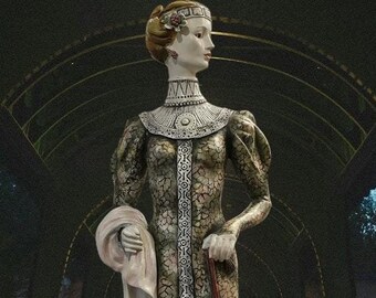 May include: A porcelain statue of a woman in a long, patterned dress holding a closed umbrella. The statue is standing on a pedestal and is set against a dark background.