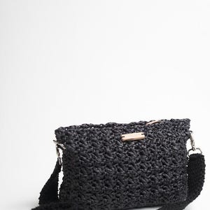 May include: A set of three ceramic mugs with a speckled, matte finish. The mugs are in shades of cream, light gray, and dark gray. Each mug has a simple, minimalist design, perfect for coffee or tea.