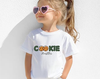 Camiseta juvenil inspirada en los Scouts "Cookie Hustler", regalo para la tropa Scout, ropa para fanáticos de las galletas