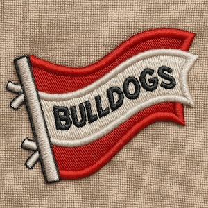 May include: Embroidered patch featuring a red and white flag design with the word "BULLDOGS" in black lettering. The patch has a detailed, textured appearance, suitable for application on apparel or accessories.