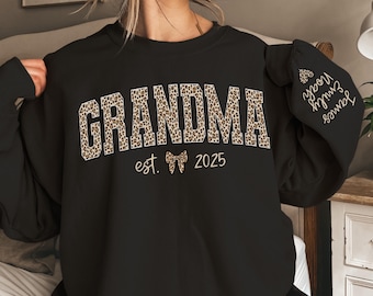 Custom Leopard Grandma Sweatshirt With Grandkids Name On Sleeve, Personalized Grandma Sweatshirt, Gift For Grandma, Christmas Gift Grandma