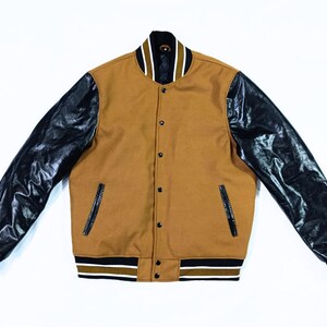 Chaqueta bomber de piel de oveja auténtica para hombre, chaqueta universitaria con bolsillo en la manga para hombre,