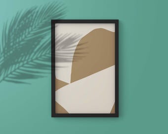 May include: A framed abstract art print with a black border. The artwork features geometric shapes in beige and off-white against a white background. A shadow of a palm frond is cast on a teal wall.