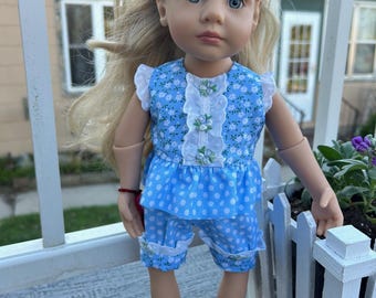 Conjunto Capri para niños pequeños de Gotz, estampado floral azul y lunares.