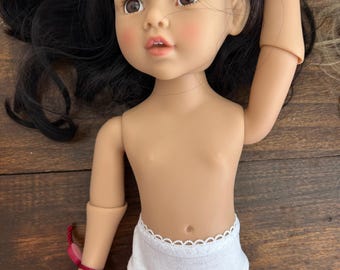 Una braguita minimalista de punto blanco para niños pequeños de Gotz