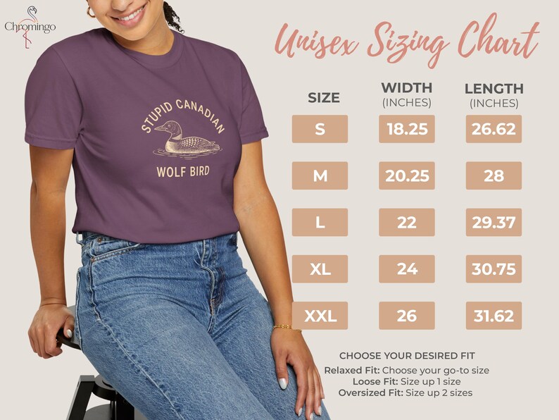 May include: A purple t-shirt with the text "STUPID CANADIAN WOLF BIRD" and a graphic of a loon. The image also includes a size chart with measurements in inches for width and length, and instructions for choosing the desired fit.