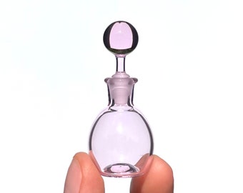Botella de perfume o tarro pequeño, vidrio soplado a mano rosa