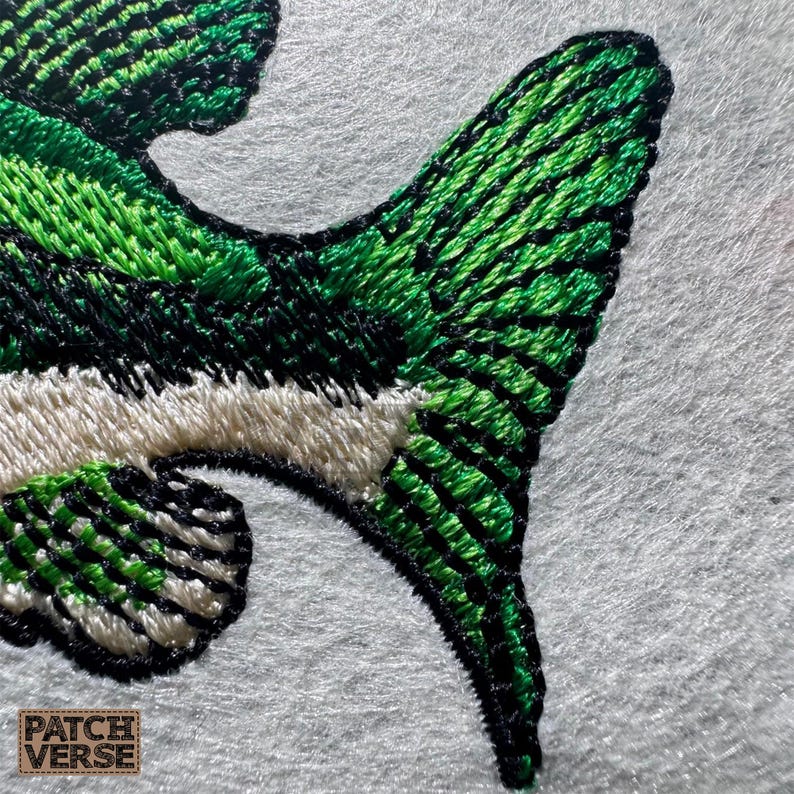 Bass fish embroidery design file stitched in a realistic largemouth bass style, professionally digitized for hats and caps. This fishing embroidery file is optimized for dad hats, trucker hats, and snapback caps, featuring clean outlines and smooth fills for outdoor, angler, and fishing brand projects. Perfect for machine embroidery on fishing hats, custom caps, and 
outdoor apparel.
