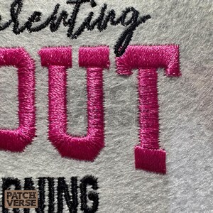 Gentle Parenting Dropout flat embroidery machine design featuring bold varsity lettering with script overlay stitched on a hat hoop setup. Funny mom life cap embroidery file perfect for dad hats, snapbacks and trucker hats. Digital embroidery design available in PES DST EXP VP3 HUS JEF XXX SEW formats for clean professional hat embroidery production..